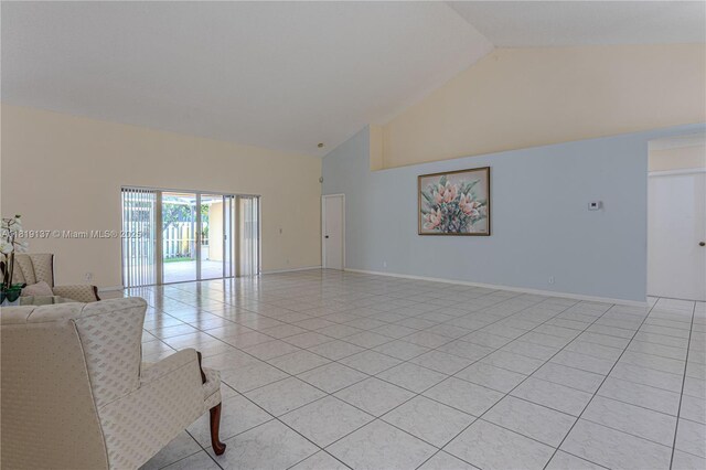16176 NW 14th Ct, Pembroke Pines, FL 33028 - living room featuring high vaulted ceiling and light tile patterned floors