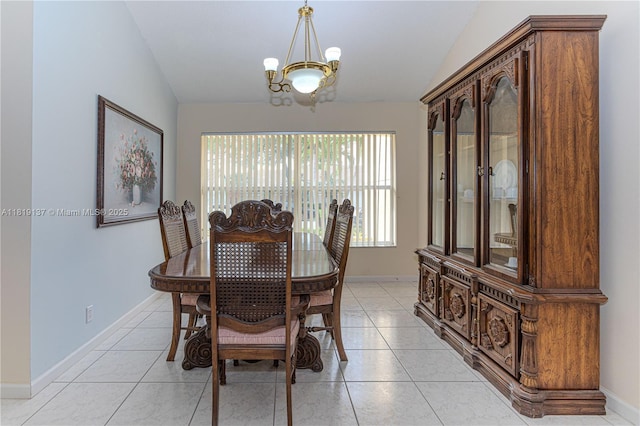 16176 NW 14th Ct, Pembroke Pines, FL 33028 - dining space with lofted ceiling, a chandelier, and light tile patterned floors