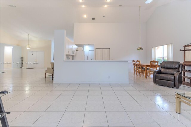 16176 NW 14th Ct, Pembroke Pines, FL 33028 - living room with high vaulted ceiling and light tile patterned flooring