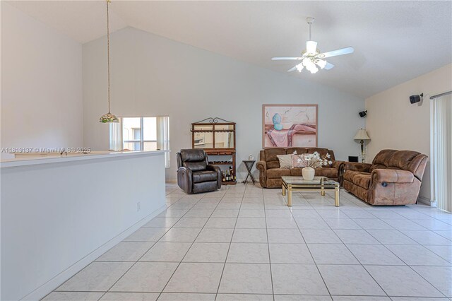 16176 NW 14th Ct, Pembroke Pines, FL 33028 - living area featuring light tile patterned floors, ceiling fan, and high vaulted ceiling