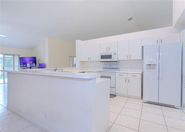 16176 NW 14th Ct, Pembroke Pines, FL 33028 - kitchen with white appliances, light tile patterned floors, light countertops, and white cabinets