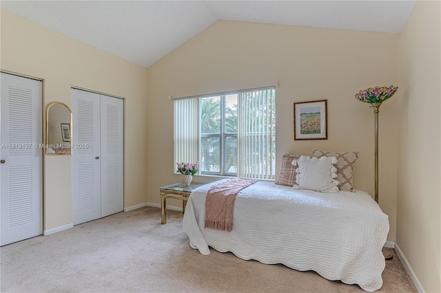 16176 NW 14th Ct, Pembroke Pines, FL 33028 - bedroom featuring two closets, lofted ceiling, and carpet floors