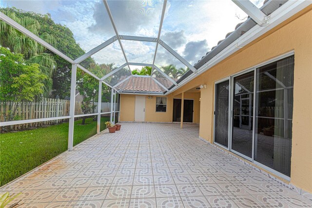 16176 NW 14th Ct, Pembroke Pines, FL 33028 - unfurnished sunroom featuring lofted ceiling