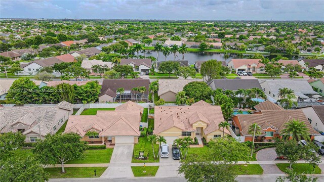 16176 NW 14th Ct, Pembroke Pines, FL 33028 - aerial perspective of suburban area featuring a large body of water