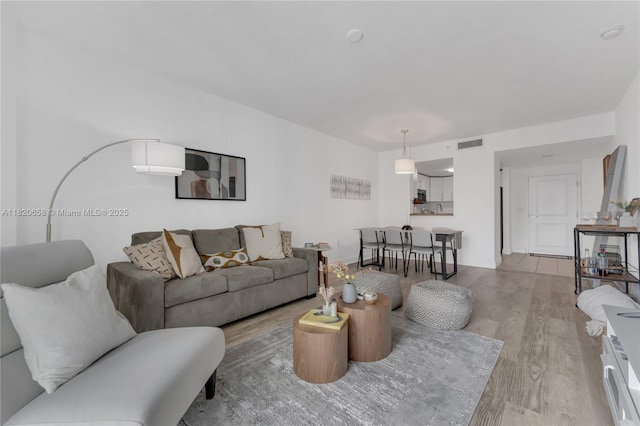 1250 S Miami Ave Unit 2210, Miami, FL 33130 - living room featuring light wood finished floors