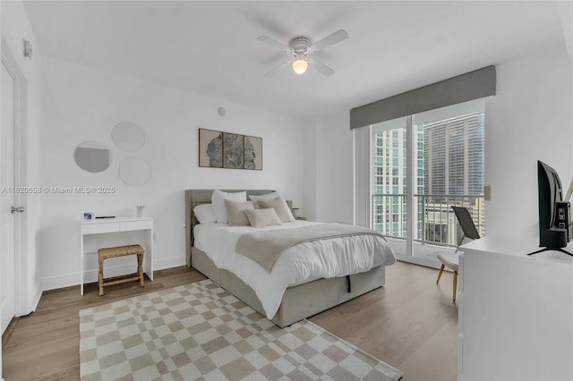 1250 S Miami Ave Unit 2210, Miami, FL 33130 - bedroom featuring light wood finished floors and ceiling fan