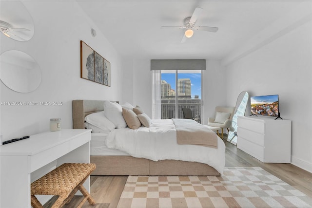 1250 S Miami Ave Unit 2210, Miami, FL 33130 - bedroom with light wood-type flooring and a ceiling fan
