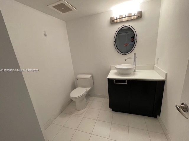 665 NE 25th St Unit 1102, Miami, FL 33137 - half bath with vanity and tile patterned flooring