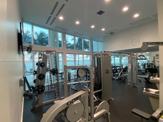 665 NE 25th St Unit 1102, Miami, FL 33137 - gym with a towering ceiling and recessed lighting