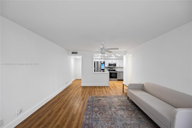 1440 Brickell Bay Unit 307, Miami, FL 33131 - living room featuring light wood-style flooring, a ceiling fan, and recessed lighting