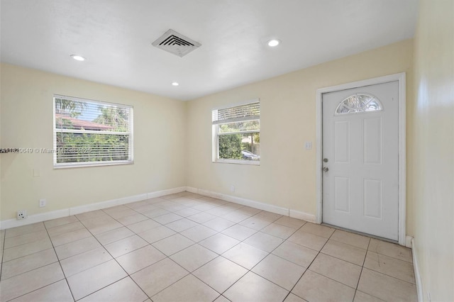 602 El Prado, West Palm Beach, FL 33405 - entrance foyer with recessed lighting and light tile patterned floors