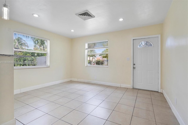 602 El Prado, West Palm Beach, FL 33405 - foyer entrance with light tile patterned floors and recessed lighting