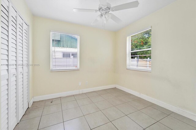 602 El Prado, West Palm Beach, FL 33405 - unfurnished bedroom with light tile patterned floors and ceiling fan