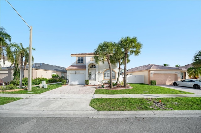15872 NW 21st St, Pembroke Pines, FL 33028 - mediterranean / spanish-style home featuring driveway, a garage, stucco siding, a tiled roof, and a front yard