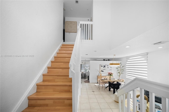 15872 NW 21st St, Pembroke Pines, FL 33028 - stairs featuring a towering ceiling and recessed lighting