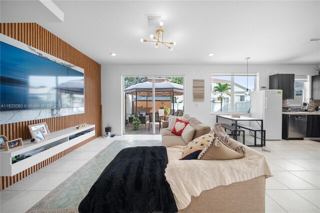 15872 NW 21st St, Pembroke Pines, FL 33028 - living area featuring light tile patterned floors, a chandelier, recessed lighting, and wooden walls