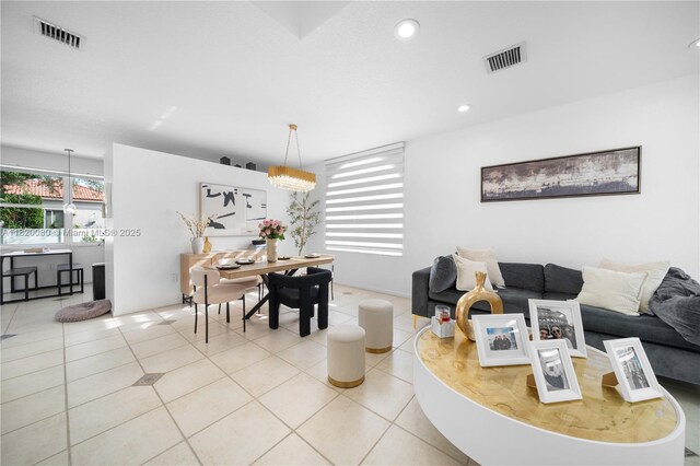 15872 NW 21st St, Pembroke Pines, FL 33028 - living room with light tile patterned flooring and recessed lighting