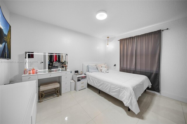 15872 NW 21st St, Pembroke Pines, FL 33028 - bedroom featuring light tile patterned floors