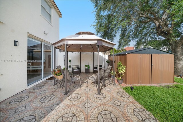 15872 NW 21st St, Pembroke Pines, FL 33028 - view of patio / terrace with a gazebo, a storage unit, and an outdoor living space