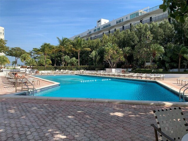 780 NE 69th St Unit 1507, Miami, FL 33138 - community pool featuring a patio area