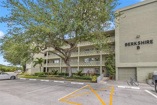 2026 Berkshire B 2026, Deerfield Beach, FL 33442 - view of apartment building / complex with uncovered parking