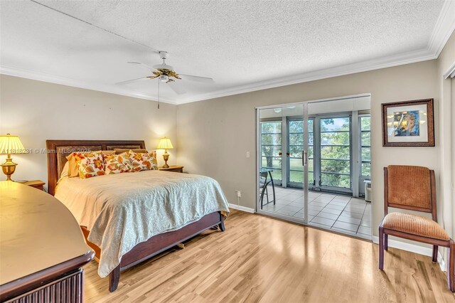 2026 Berkshire B 2026, Deerfield Beach, FL 33442 - bedroom featuring a textured ceiling, access to outside, wood finished floors, crown molding, and ceiling fan