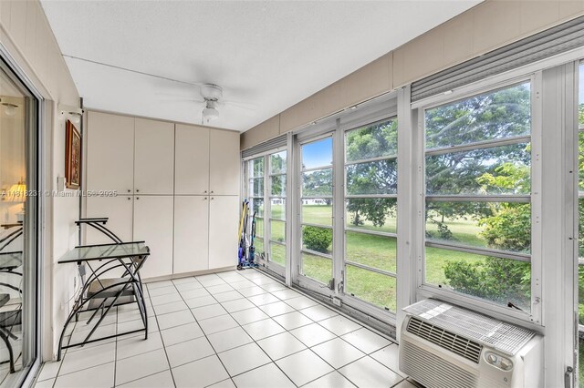 2026 Berkshire B 2026, Deerfield Beach, FL 33442 - unfurnished sunroom featuring tile patterned floors, a ceiling fan, and cooling unit