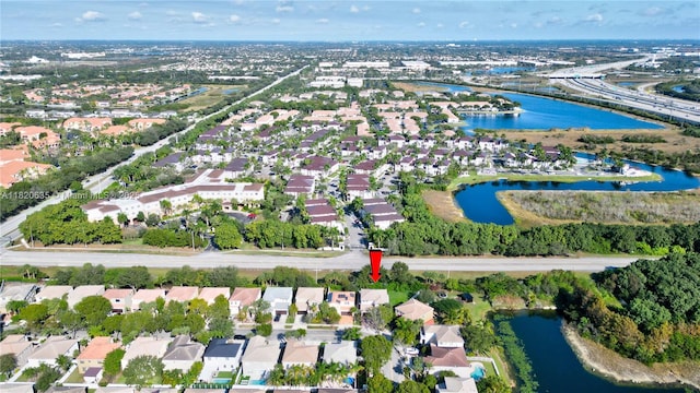 4801 SW 158th Ave, Miramar, FL 33027 - aerial view of property and surrounding area featuring a large body of water and nearby suburban area