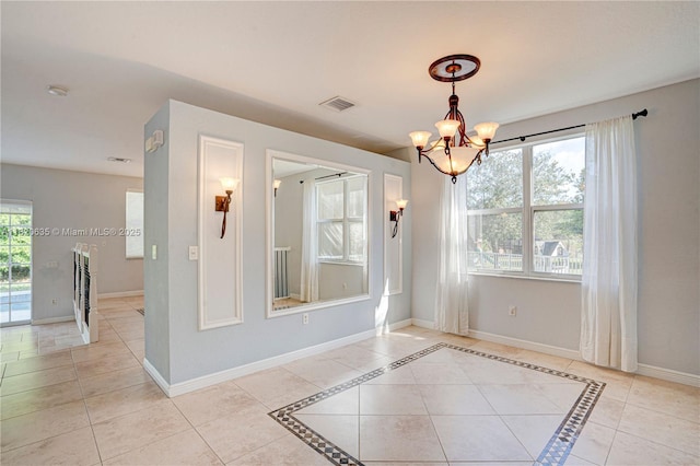 4801 SW 158th Ave, Miramar, FL 33027 - unfurnished dining area with a chandelier and light tile patterned floors