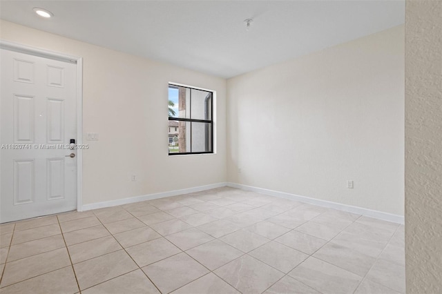 3411 W 112th Ter, Hialeah, FL 33018 - empty room with light tile patterned floors and recessed lighting
