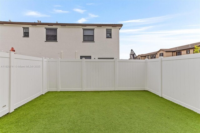 3411 W 112th Ter, Hialeah, FL 33018 - view of fenced backyard