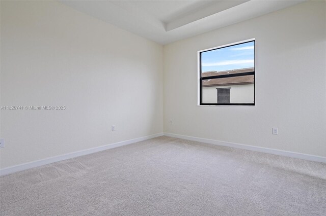 3411 W 112th Ter, Hialeah, FL 33018 - spare room featuring carpet