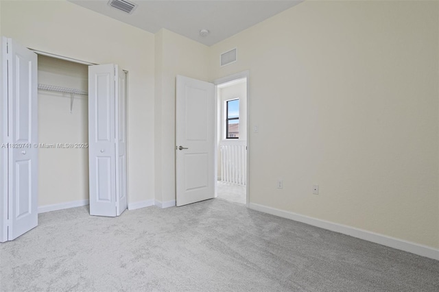 3411 W 112th Ter, Hialeah, FL 33018 - unfurnished bedroom with carpet flooring and a closet