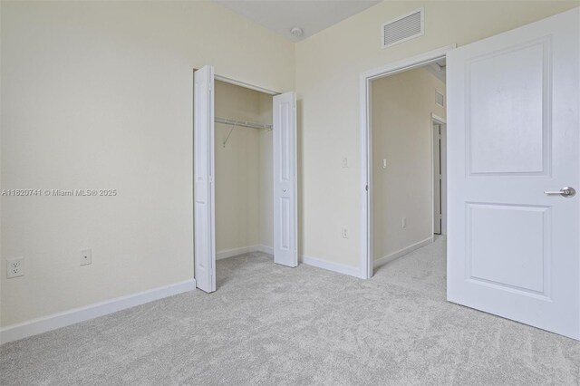 3411 W 112th Ter, Hialeah, FL 33018 - unfurnished bedroom featuring carpet and a closet
