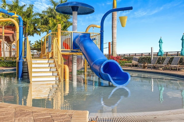 3411 W 112th Ter, Hialeah, FL 33018 - view of swimming pool with a water slide and a water play area