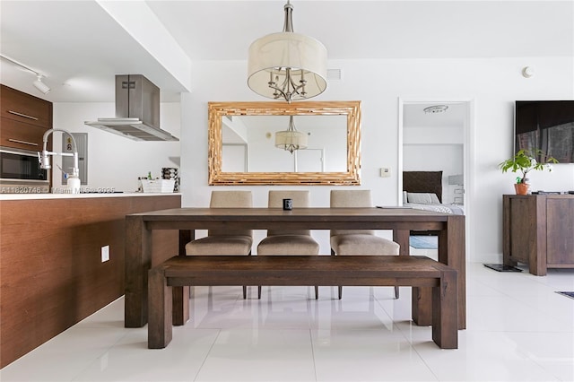 495 Brickell Ave Unit 905, Miami, FL 33131 - dining room with light tile patterned floors
