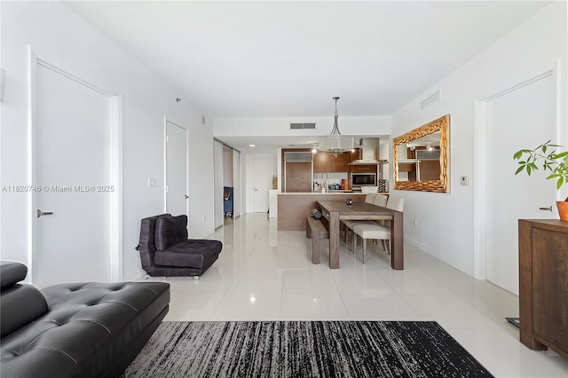 495 Brickell Ave Unit 905, Miami, FL 33131 - living area with light tile patterned floors and baseboards