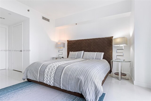 495 Brickell Ave Unit 905, Miami, FL 33131 - bedroom featuring tile patterned floors