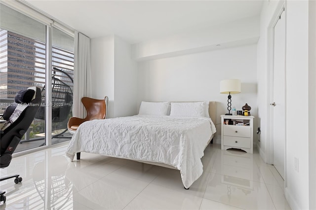 495 Brickell Ave Unit 905, Miami, FL 33131 - bedroom with access to outside and floor to ceiling windows