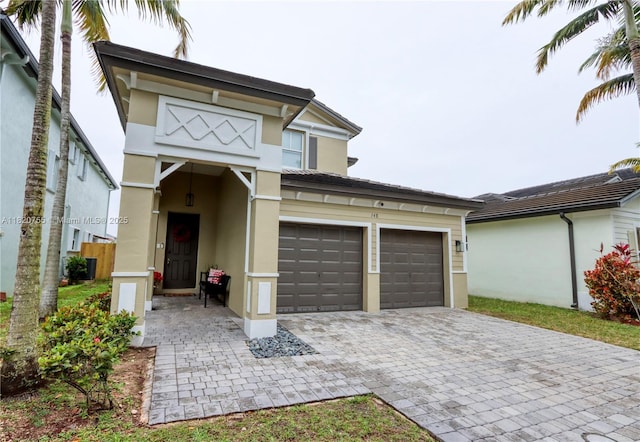 148 NE 36th Avenue Rd, Homestead, FL 33033 - view of front of house with stucco siding and decorative driveway