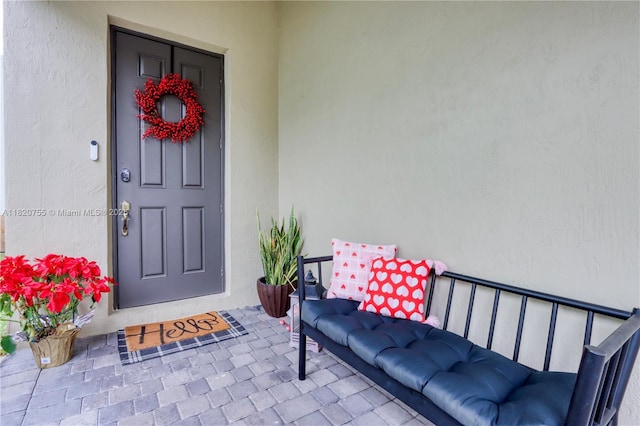 148 NE 36th Avenue Rd, Homestead, FL 33033 - view of exterior entry featuring stucco siding