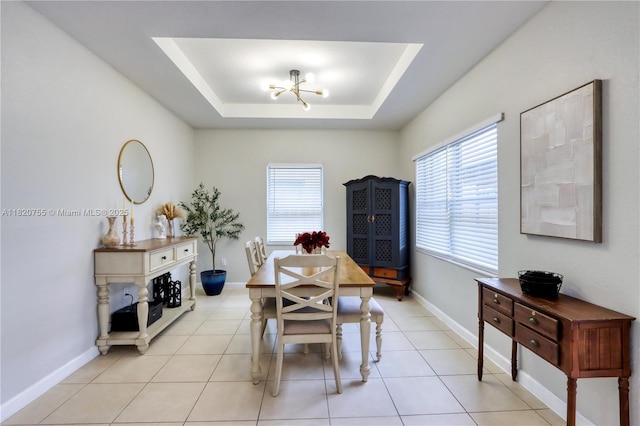 148 NE 36th Avenue Rd, Homestead, FL 33033 - dining space featuring plenty of natural light, a chandelier, a raised ceiling, and light tile patterned floors