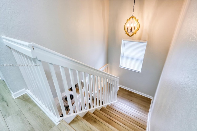 148 NE 36th Avenue Rd, Homestead, FL 33033 - stairway with wood finished floors and a chandelier