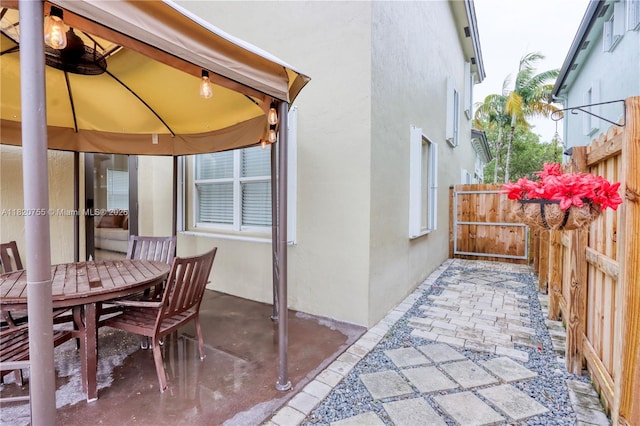 148 NE 36th Avenue Rd, Homestead, FL 33033 - view of patio with outdoor dining area and a gazebo