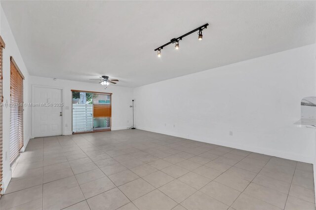 14388 SW 96th Ln, Miami, FL 33186 - spare room featuring ceiling fan and light tile patterned floors