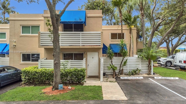 14388 SW 96th Ln, Miami, FL 33186 - view of property with uncovered parking
