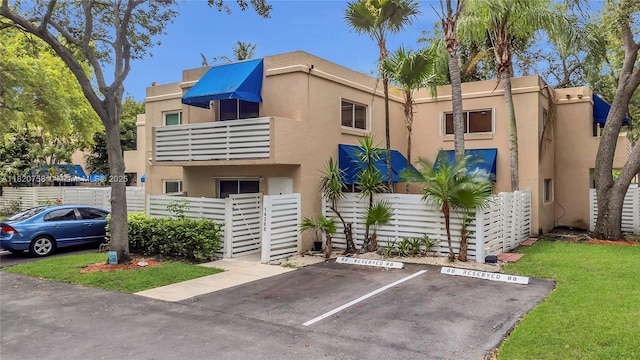 14388 SW 96th Ln, Miami, FL 33186 - view of building exterior with uncovered parking