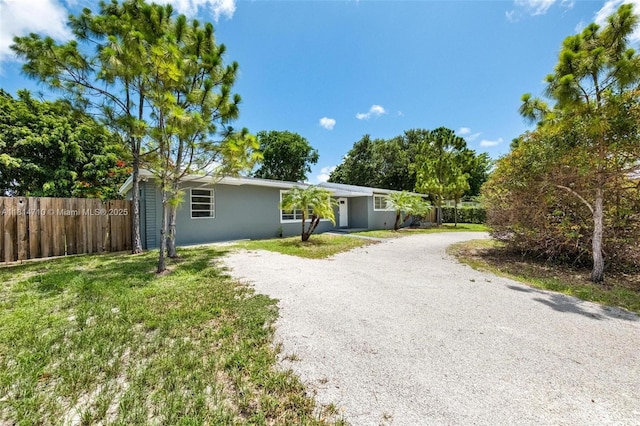 9221 SW 167th Ter, Palmetto Bay, FL 33157 - view of front of property featuring driveway and stucco siding