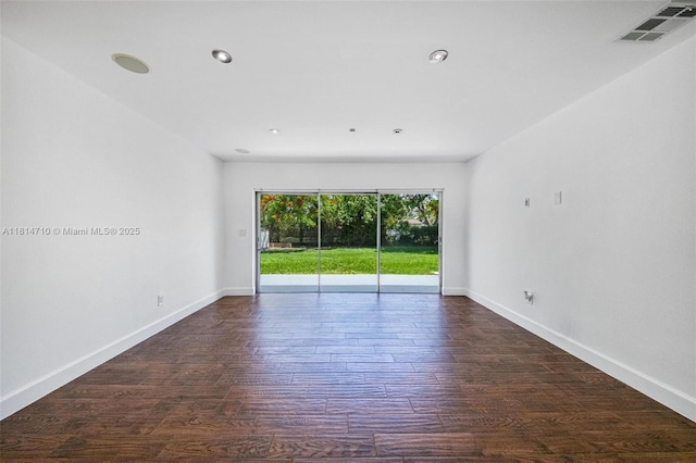 9221 SW 167th Ter, Palmetto Bay, FL 33157 - empty room featuring wood finished floors and recessed lighting