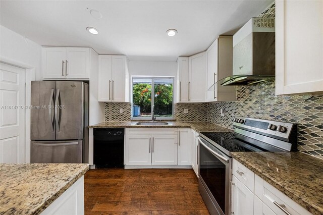 9221 SW 167th Ter, Palmetto Bay, FL 33157 - kitchen featuring stainless steel appliances, wall chimney exhaust hood, light stone countertops, white cabinets, and backsplash